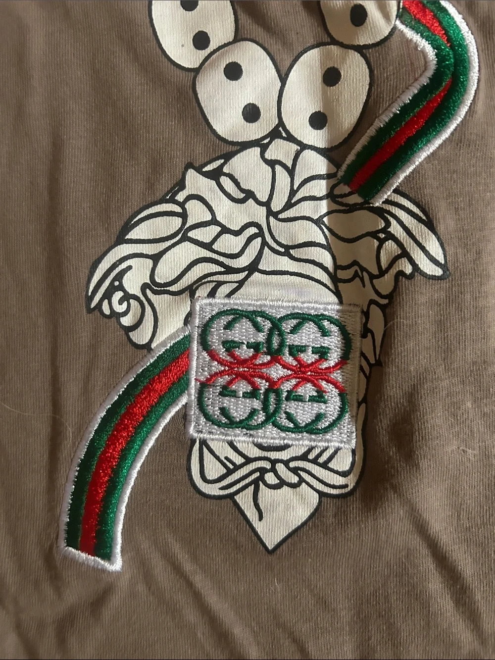 AUTHENTIC-Gucci Taupe Long Sleeve Tee / White Graphic and embroidered Green-NEW